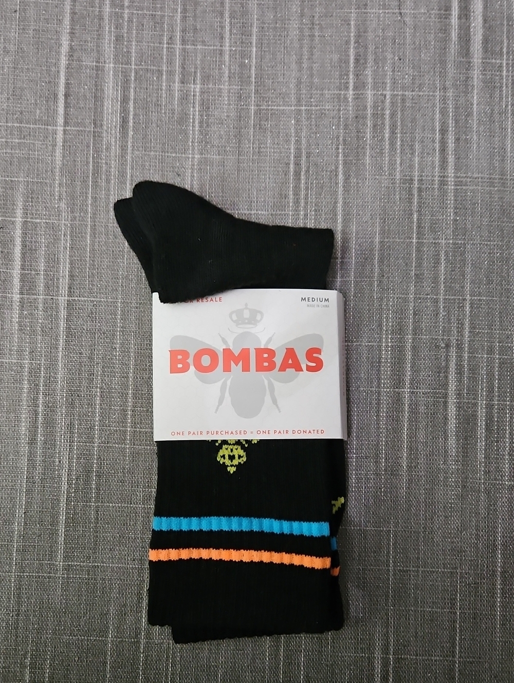Bombas Black Crew Socks with Blue and Orange Stripe Accents